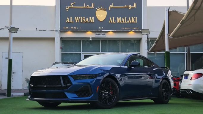 Used ⁦Ford Mustang GT VII, 5.0 l, 2024⁩ in UAE, Sharjah by Al Wisam Al Malaki Used Cars, Navy Blue color. GCC Specs | AUTO.AE | Listing #290306