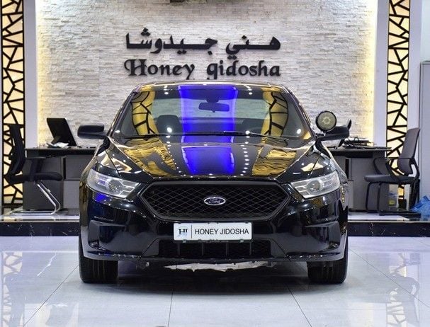 Used Ford Taurus VI Facelift, 3.5 l, 2015 in Sharjah by Honey Gidosha Used Cars Tr., Black color.  | AUTO.AE