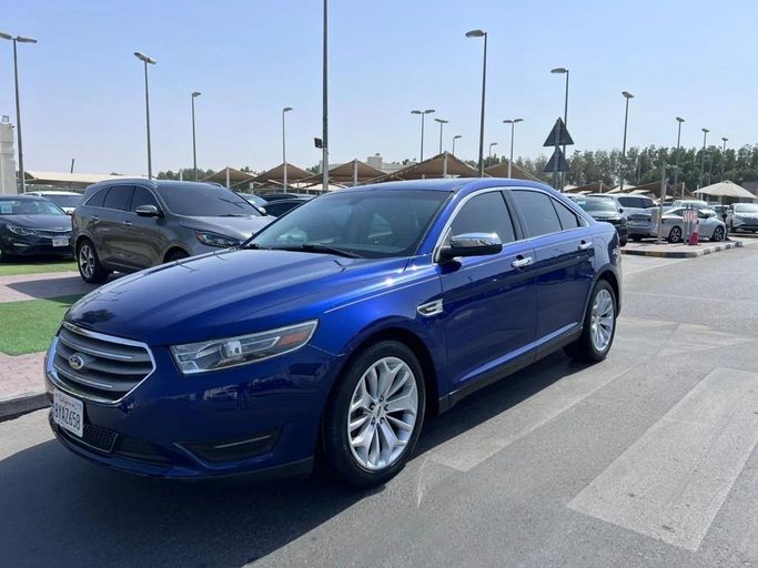Подержанный Ford Taurus VI Рестайлинг, 3.5 л, 2015 в Шардже от Tabarak Used Cars Синий цвет. Американская | AUTO.AE