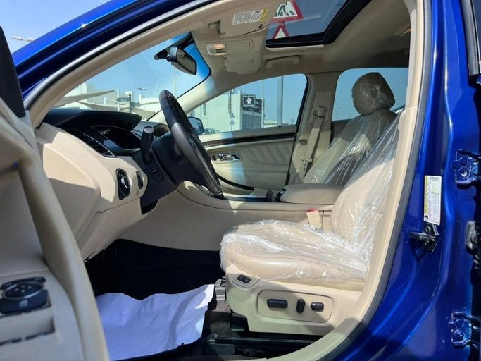 Подержанный Ford Taurus VI Рестайлинг, 3.5 л, 2015 в Шардже от Tabarak Used Cars Синий цвет. Американская | AUTO.AE