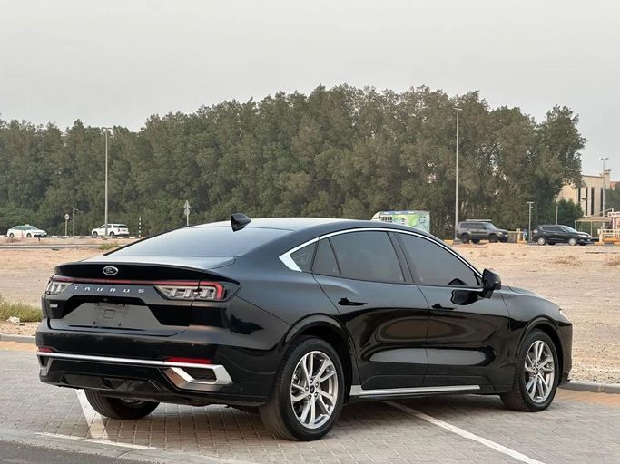 Подержанный Ford Taurus VI Рестайлинг, 2.0 л, 2019 в Шардже от Al Jana Used Cars Черный цвет. GCC | AUTO.AE