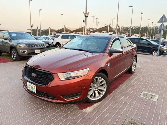 Подержанный ⁦Ford Taurus VI Рестайлинг, 3.5 л, 2014⁩ в ОАЭ, Шарджа от Tabarak Used Cars Красный цвет. Американская | AUTO.AE | Объявление #292947