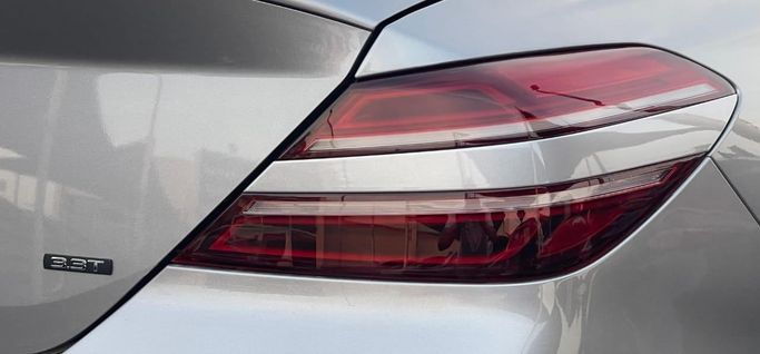 Used Genesis G70 I Facelift, 3.3 l, 2023 in Sharjah by Al Nukhba Al Malakyah Used Cars, Grey color. American Specs | AUTO.AE