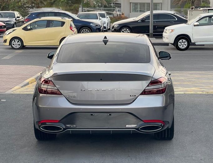 Used Genesis G70 I Facelift, 3.3 l, 2023 in Sharjah by Al Nukhba Al Malakyah Used Cars, Grey color. American Specs | AUTO.AE