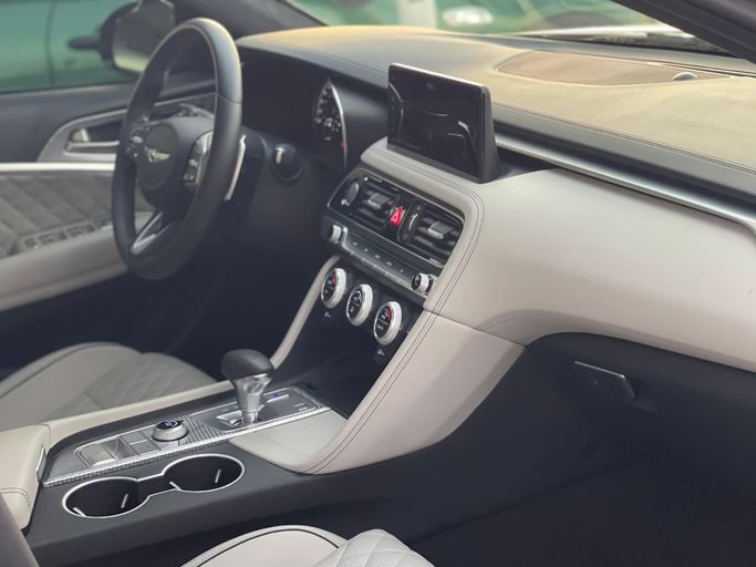 Used Genesis G70 I Facelift, 3.3 l, 2023 in Sharjah by Al Nukhba Al Malakyah Used Cars, Grey color. American Specs | AUTO.AE