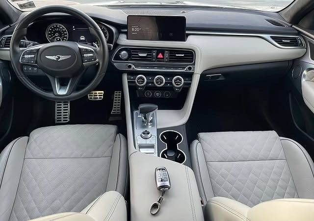 Used Genesis G70 I Facelift, 3.3 l, 2023 in Sharjah by Al Nukhba Al Malakyah Used Cars, Grey color. American Specs | AUTO.AE