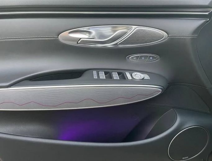 Used Genesis GV70 I, 2.5 l, 2023 in Sharjah by Al Nukhba Al Malakyah Used Cars, Burgundy color. American Specs | AUTO.AE