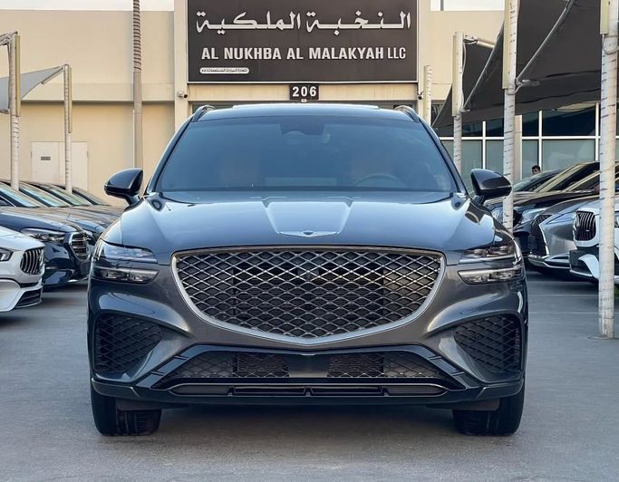 Подержанный Genesis GV70 I, 2.5 л, 2023 в Шардже от Al Nukhba Al Malakyah Used Cars Серый цвет. Американская | AUTO.AE