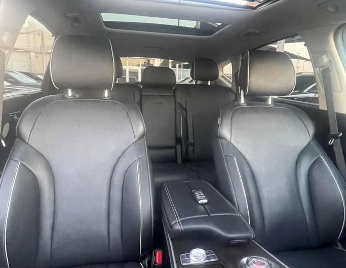 Подержанный Genesis GV80 I, 3.5 л, 2021 в Шардже от Al Nukhba Al Malakyah Used Cars Бордовый цвет. Американская | AUTO.AE