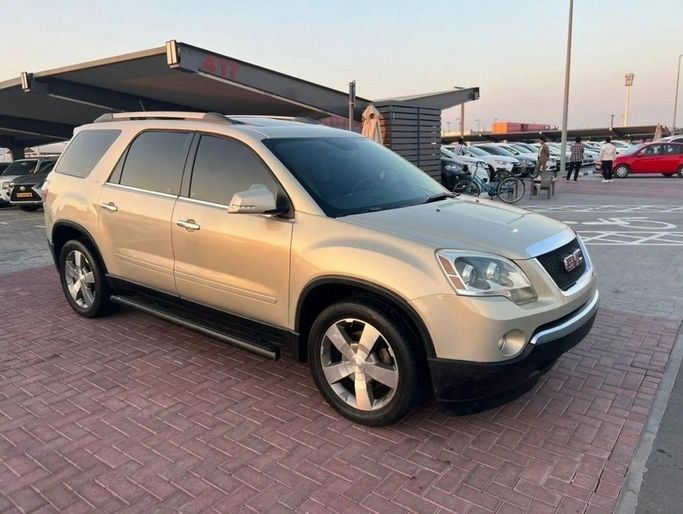 Used GMC Acadia I, 3.6 l, 2011 in Sharjah by Halla Cars, Golden color. GCC Specs | AUTO.AE