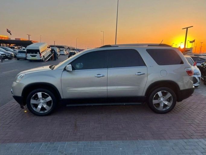 Used GMC Acadia I, 3.6 l, 2011 in Sharjah by Halla Cars, Golden color. GCC Specs | AUTO.AE