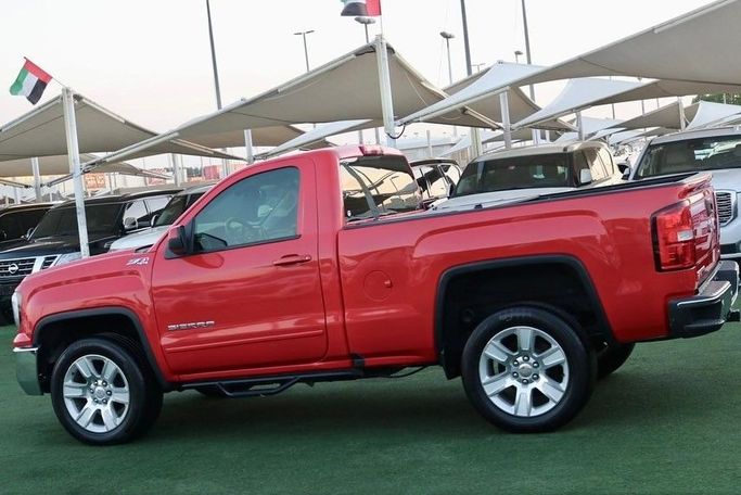 Подержанный GMC Sierra III (K2XX) Рестайлинг, 5.3 л, 2018 в Шардже от Al Bake Used Cars Красный цвет. GCC | AUTO.AE
