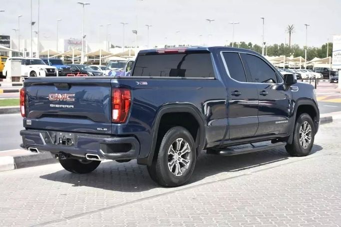 Used GMC Sierra IV, 5.3 l, 2021 in Sharjah by Alfaris Used Cars, Blue color. Other | AUTO.AE