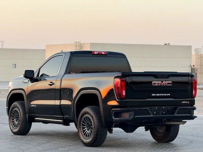 Used GMC Sierra IV, 6.2 l, 2022 in Sharjah by Al Ahd Used Cars, Black color. GCC Specs | AUTO.AE