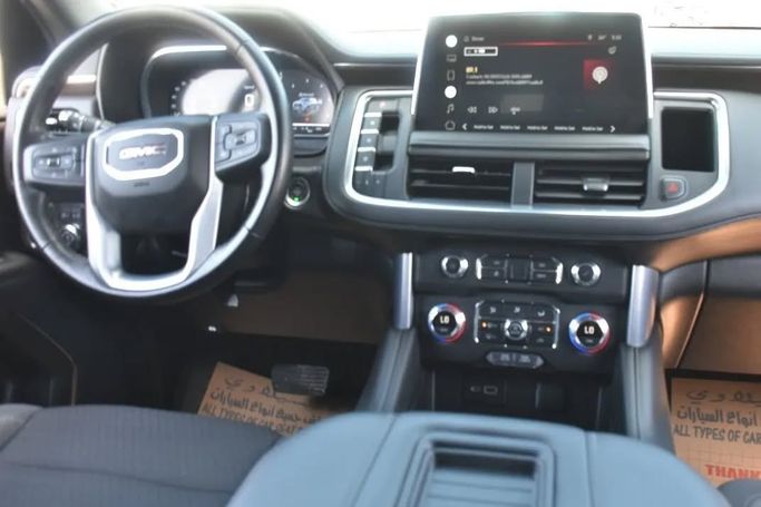 Подержанный GMC Yukon V, 5.3 л, 2022 в Шардже от Alfaris Used Cars Черный цвет. Other | AUTO.AE