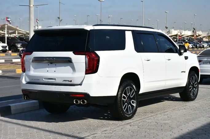 Подержанный GMC Yukon XL V, 6.2 л, 2023 в Шардже от Alfaris Used Cars Белый цвет. Other | AUTO.AE
