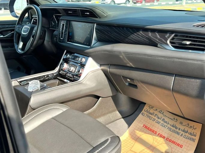 Подержанный GMC Yukon XL V, 6.2 л, 2021 в Шардже от Alfaris Used Cars Черный цвет. Other | AUTO.AE