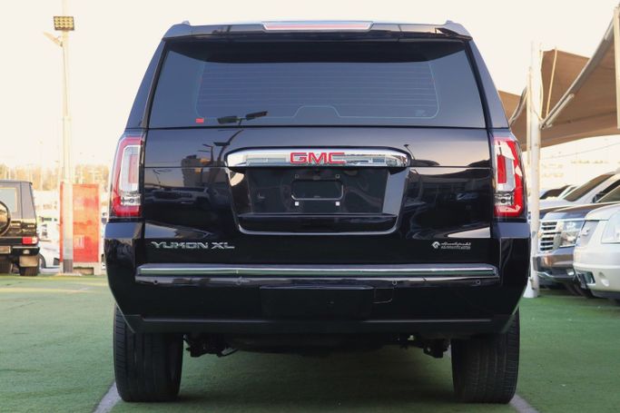 Подержанный GMC Yukon XL IV (GMT K2UG), 6.2 л, 2017 в Шардже от Dar Al Hay Used Cars Черный цвет. Other | AUTO.AE
