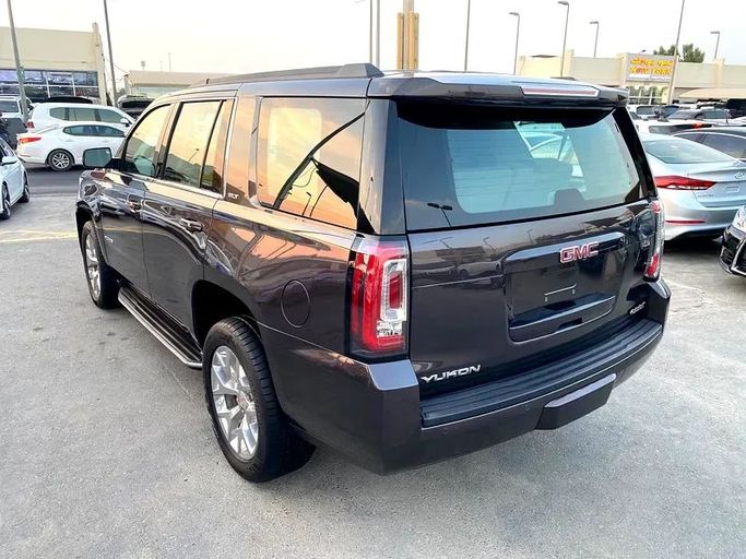 Подержанный GMC Yukon XL IV (GMT K2UG), 6.2 л, 2018 в Шардже от Al Saqr Al Mutaliq Черный цвет. GCC | AUTO.AE