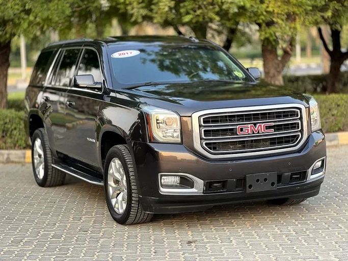 Подержанный GMC Yukon IV (GMT K2UG), 5.3 л, 2017 в Шардже от Taj Al Impratoor Used Cars Коричневый цвет. GCC | AUTO.AE