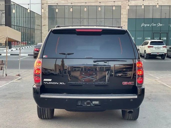 Подержанный GMC Yukon XL III (GMT900), 6.2 л, 2012 в Шардже от Darb Al Saada Used cars Черный цвет. GCC | AUTO.AE