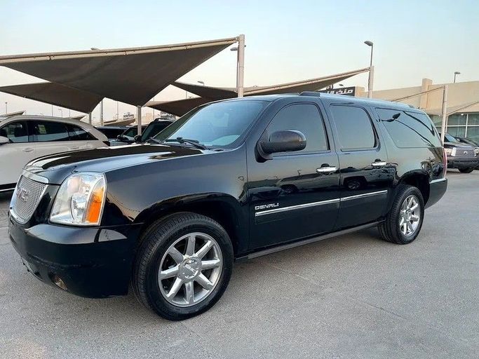 Подержанный GMC Yukon XL III (GMT900), 6.2 л, 2012 в Шардже от Darb Al Saada Used cars Черный цвет. GCC | AUTO.AE