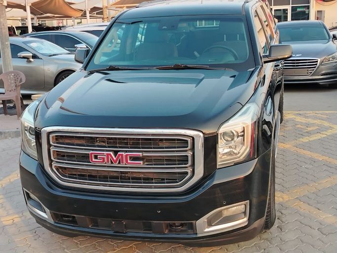 Подержанный GMC Yukon XL IV (GMT K2UG), 6.2 л, 2018 в Шардже от Al Helal Al Abyadh Used Cars Черный цвет. GCC | AUTO.AE