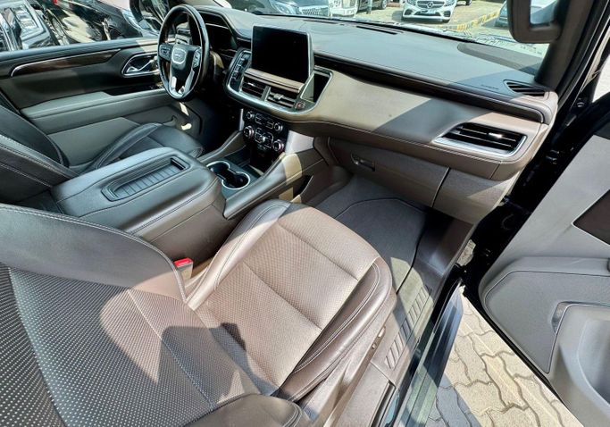 Used GMC Yukon V, 5.3 l, 2023 in Sharjah by DCB Cars, Black color. GCC Specs | AUTO.AE