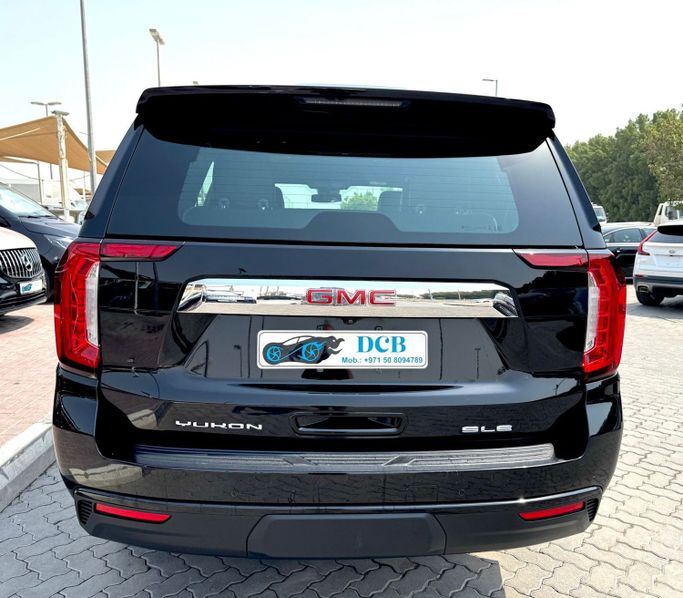 Used GMC Yukon V, 5.3 l, 2023 in Sharjah by DCB Cars, Black color. GCC Specs | AUTO.AE