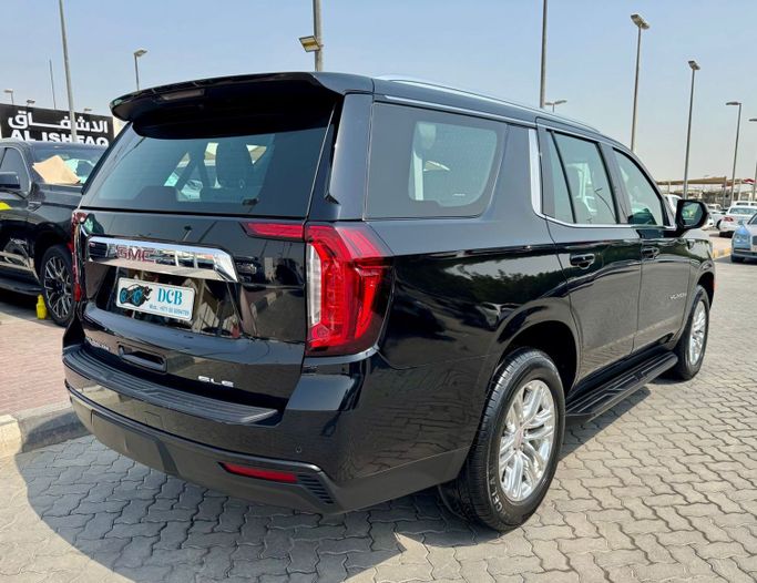 Used GMC Yukon V, 5.3 l, 2023 in Sharjah by DCB Cars, Black color. GCC Specs | AUTO.AE