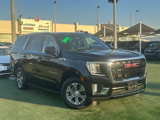 Used GMC Yukon V, 5.3 l, 2021 in Sharjah by Badar Used Cars, Black color.  | AUTO.AE