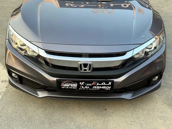 Used Honda Civic X, 2.0 l, 2019 in Sharjah by Elmorshedi Motors, Black color. GCC Specs | AUTO.AE
