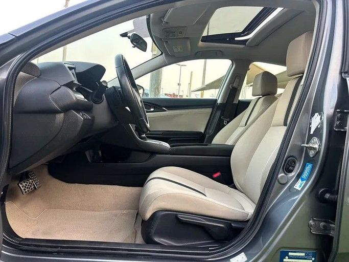 Used Honda Civic X, 1.6 l, 2020 in Sharjah by Almasar Used Cars, Grey color. GCC Specs | AUTO.AE