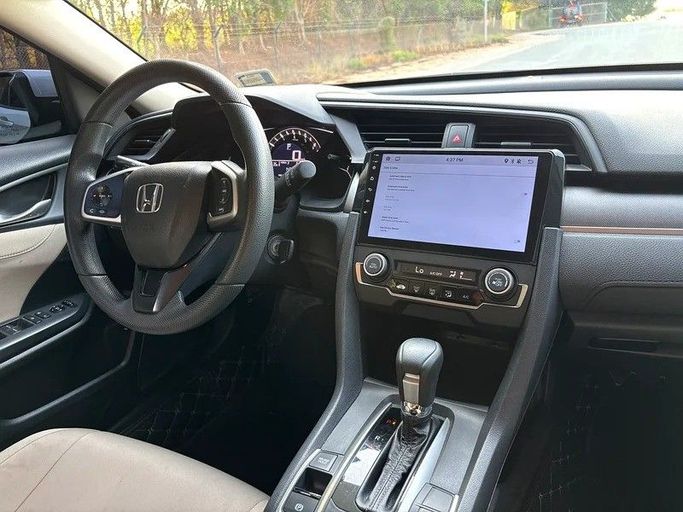 Used Honda Civic X, 1.6 l, 2018 in Sharjah by Almasar Used Cars, Silver color. GCC Specs | AUTO.AE