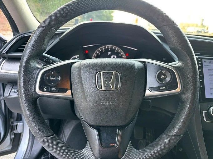 Used Honda Civic X, 1.6 l, 2018 in Sharjah by Almasar Used Cars, Silver color. GCC Specs | AUTO.AE