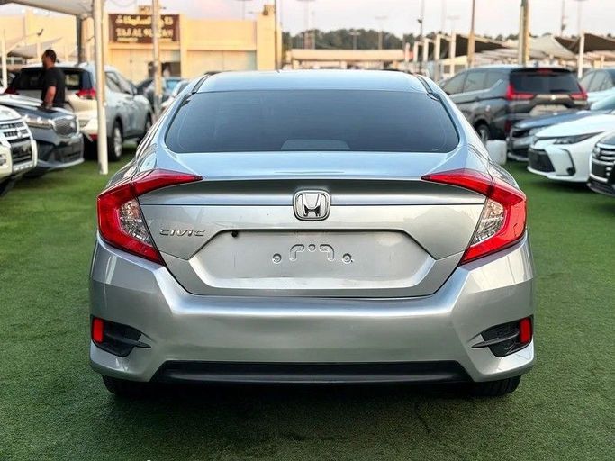 Used Honda Civic X, 1.6 l, 2018 in Sharjah by Almasar Used Cars, Silver color. GCC Specs | AUTO.AE