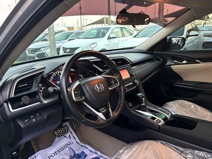 Used Honda Civic X, 2.0 l, 2020 in Sharjah by Almasar Used Cars, Silver color. GCC Specs | AUTO.AE