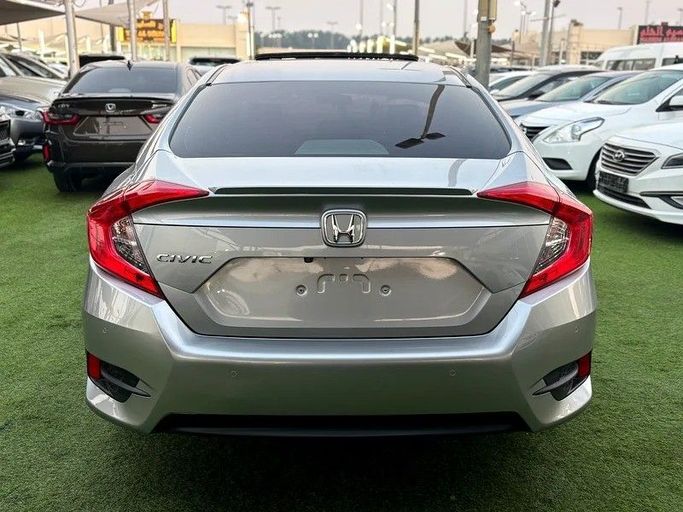 Used Honda Civic X, 2.0 l, 2020 in Sharjah by Almasar Used Cars, Silver color. GCC Specs | AUTO.AE