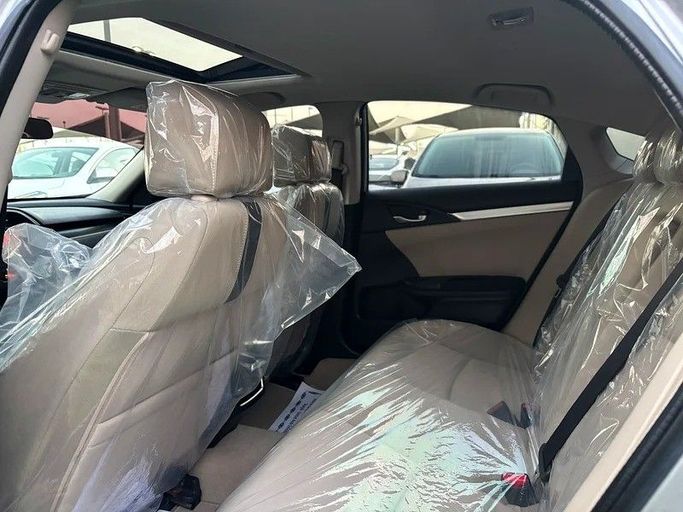 Used Honda Civic X, 2.0 l, 2020 in Sharjah by Almasar Used Cars, Silver color. GCC Specs | AUTO.AE