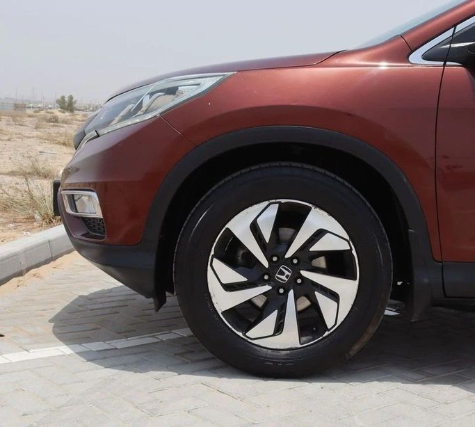 Подержанный Honda CR-V IV Рестайлинг, 2.4 л, 2015 в Шардже от Al Sayed Khamis Used Cars Бронзовый цвет. GCC | AUTO.AE