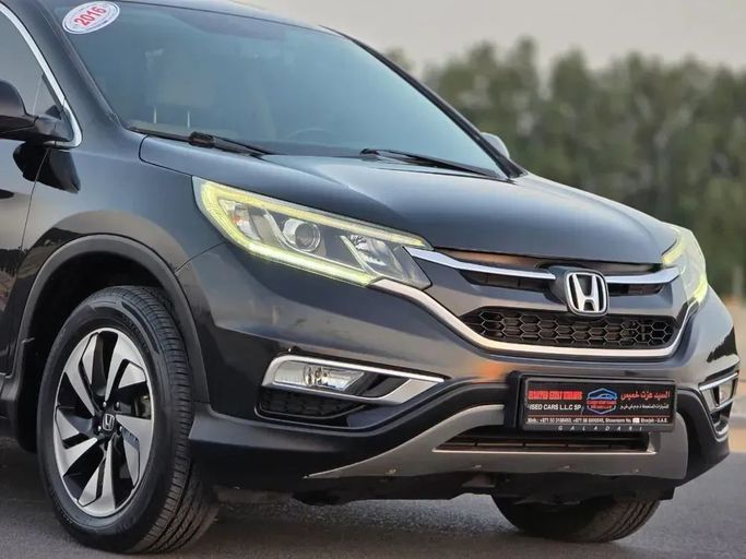 Подержанный Honda CR-V IV Рестайлинг, 2.0 л, 2016 в Шардже от Al Sayed Ezzat Khamis Черный цвет. GCC | AUTO.AE