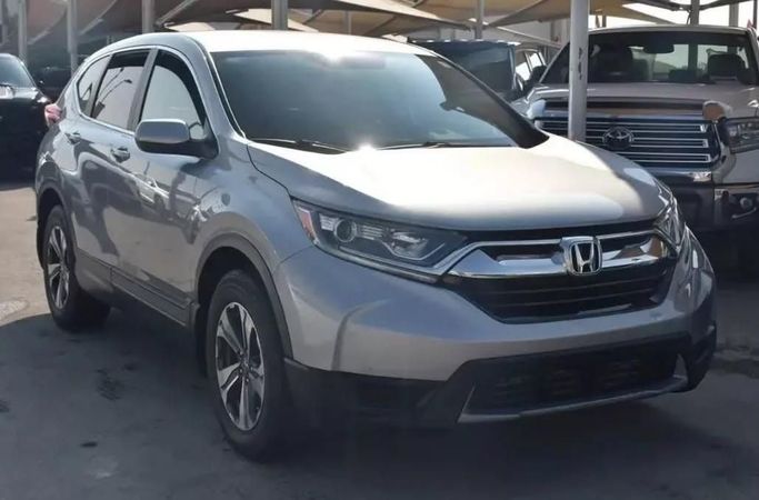 Подержанный Honda CR-V V, 2.0 л, 2017 в Шардже от Alfaris Used Cars Серебристый цвет. Other | AUTO.AE