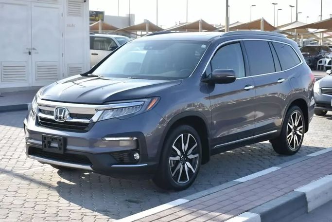 Подержанный Honda Pilot III Рестайлинг, 3.0 л, 2022 в Шардже от Alfaris Used Cars Серый цвет. Other | AUTO.AE
