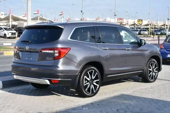 Подержанный Honda Pilot III Рестайлинг, 3.0 л, 2022 в Шардже от Alfaris Used Cars Серый цвет. Other | AUTO.AE