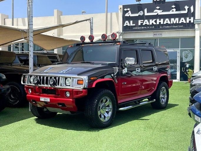 Подержанный Hummer H2 I Рестайлинг, 6.2 л, 2009 в Шардже от Al Fakhamah Used Cars Красный цвет. GCC | AUTO.AE