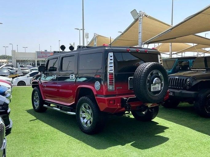 Подержанный Hummer H2 I Рестайлинг, 6.2 л, 2009 в Шардже от Al Fakhamah Used Cars Красный цвет. GCC | AUTO.AE
