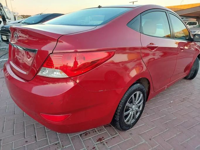 Used Hyundai Accent IV, 1.6 l, 2015 in Sharjah by Al Aqsa Used Cars, Red color. GCC Specs | AUTO.AE