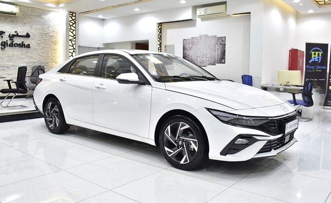 Новый Hyundai Elantra VII (CN7) Рестайлинг, 1.6 л, 2025 в Шардже от Honey Gidosha Used Cars Tr. Белый цвет.  | AUTO.AE