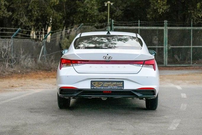 Used Hyundai Elantra VII (CN7) Facelift, 1.6 l, 2023 in Sharjah by First Choice Cars, White color. GCC Specs | AUTO.AE