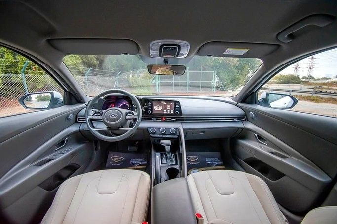 Used Hyundai Elantra VII (CN7) Facelift, 1.6 l, 2023 in Sharjah by First Choice Cars, White color. GCC Specs | AUTO.AE